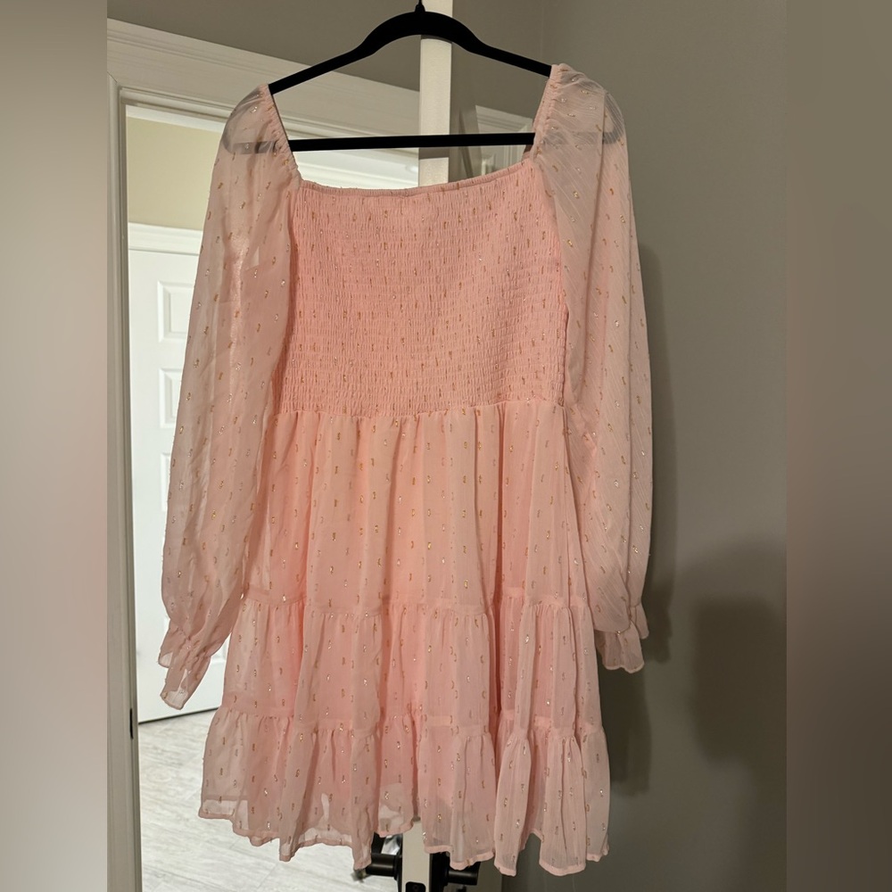 pink dress with gold accents
